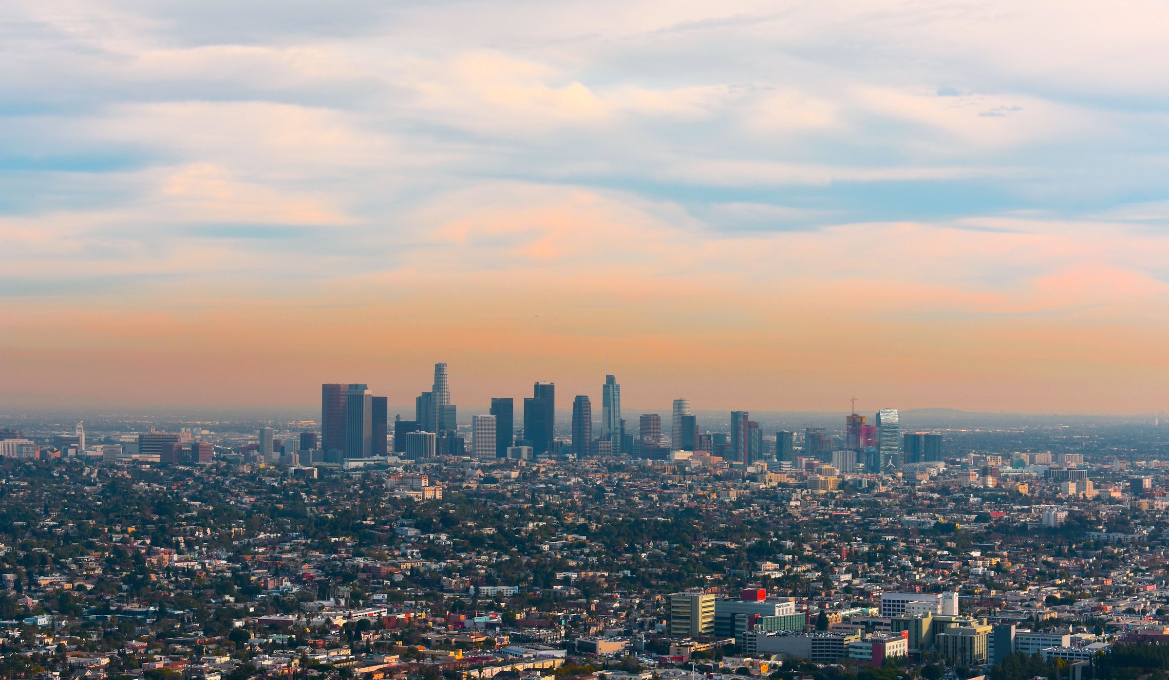 Downtown Los Angeles beneath a softly colored California sky